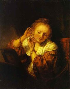 Młoda Kobieta Próbująca Nauszników — Rembrandt Van Rijn, Dutch Baroque