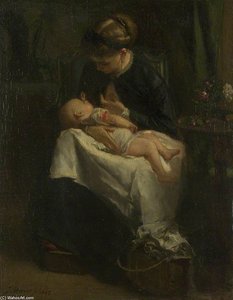 A Young Woman Nursing A Baby