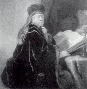 A Scholar Seated At A Desk — Rembrandt Van Rijn